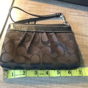 Coach wristlet black 6.5” x 4.5”